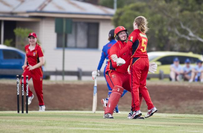 South Australia's Kylie Rattray and Taylah Gregory celebrate the stumping of Kaia Arua, EAP.