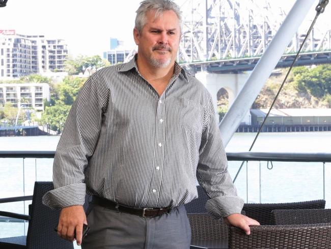 Jade Buddha owner Phil Hogan stands in his empty restaurant overlooking Brisbane River and the Story Bridge, Riverside, G20 Summit, Brisbane. Photographer: Liam Kidston.