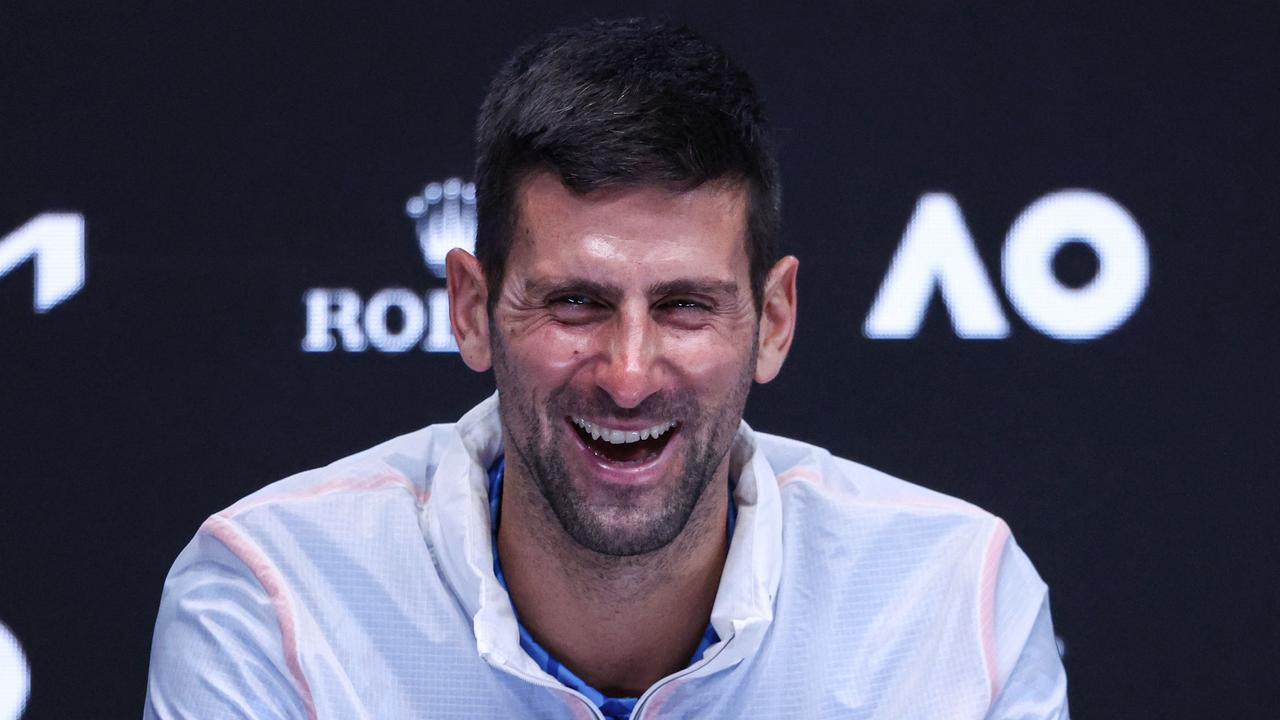 Serbia's Novak Djokovic speaks after winning his 10th Australian Open. Photo by DAVID GRAY / AFP.