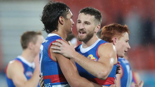 Marcus Bontempelli and Jamarra Ugle-Hagan. Photo by Mark Metcalfe/AFL Photos/via Getty Images.