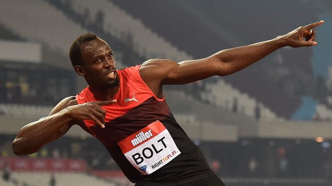 Jamaica's Usain Bolt creates his 'Lightening Bolt' pose as he celebrates winning the men's 200m at the IAAF Diamond League Anniversary Games athletics meeting.