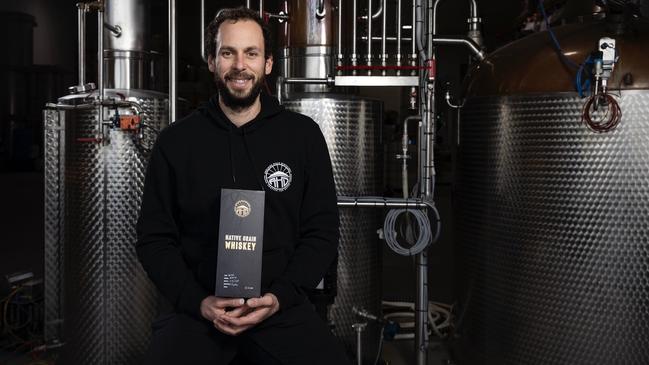 Adelaide Hills Distillery's Sacha La Forgia with his award winning Native Grain Whiskey. Picture: Ben Macmahon