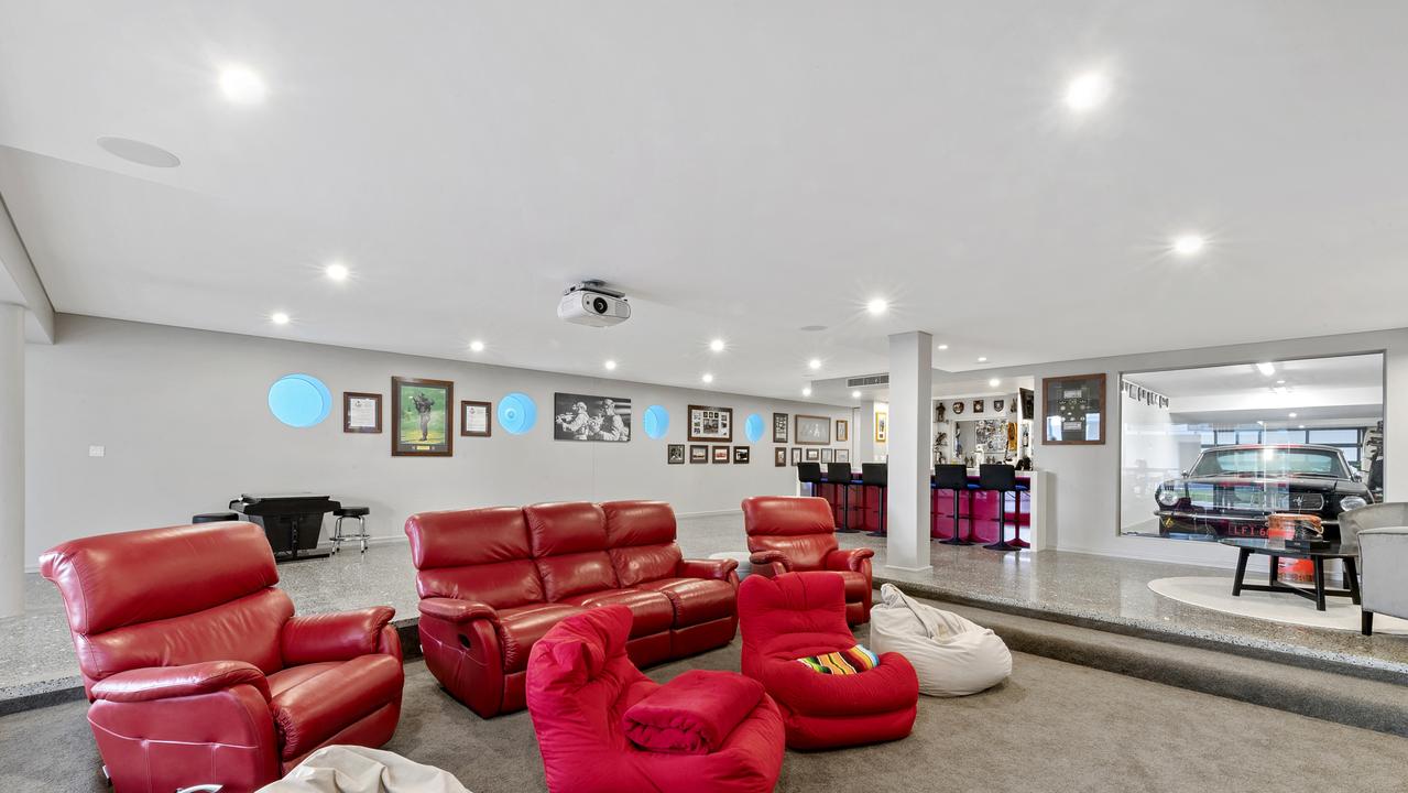 The home has a fully equipped bar and cinema room.