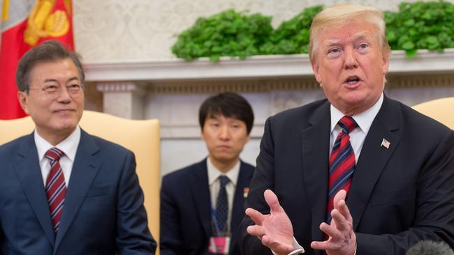 Donald Trump speaks as South Korean President Moon Jae-in looks on. Picture: AFP.