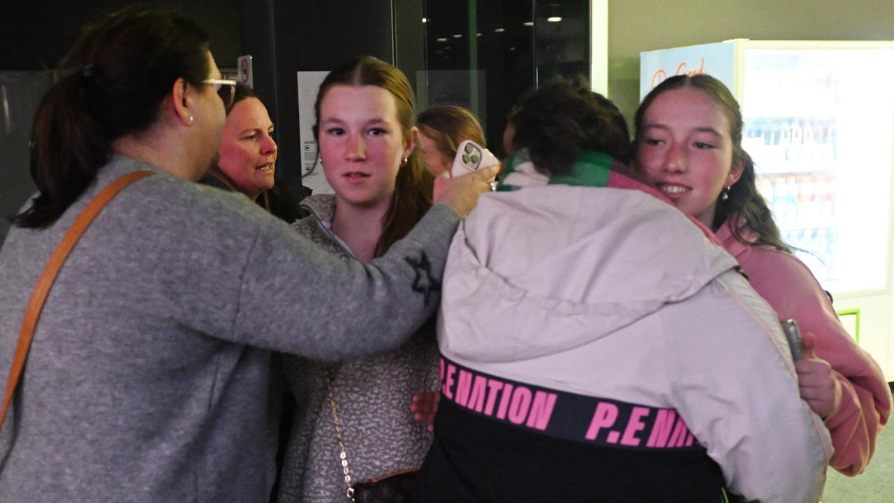 Relieved customers leave Westfield Marion. Picture: NewsWire / Brenton Edwards