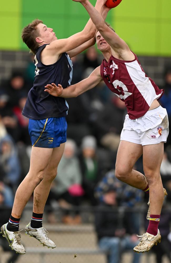 Patrick Snell playing for Queensland attempts to spoil Logan Morris of Vic Metro in an AFL Pathways match in 2022. Picture: Morgan Hancock/AFL Photos via Getty Images