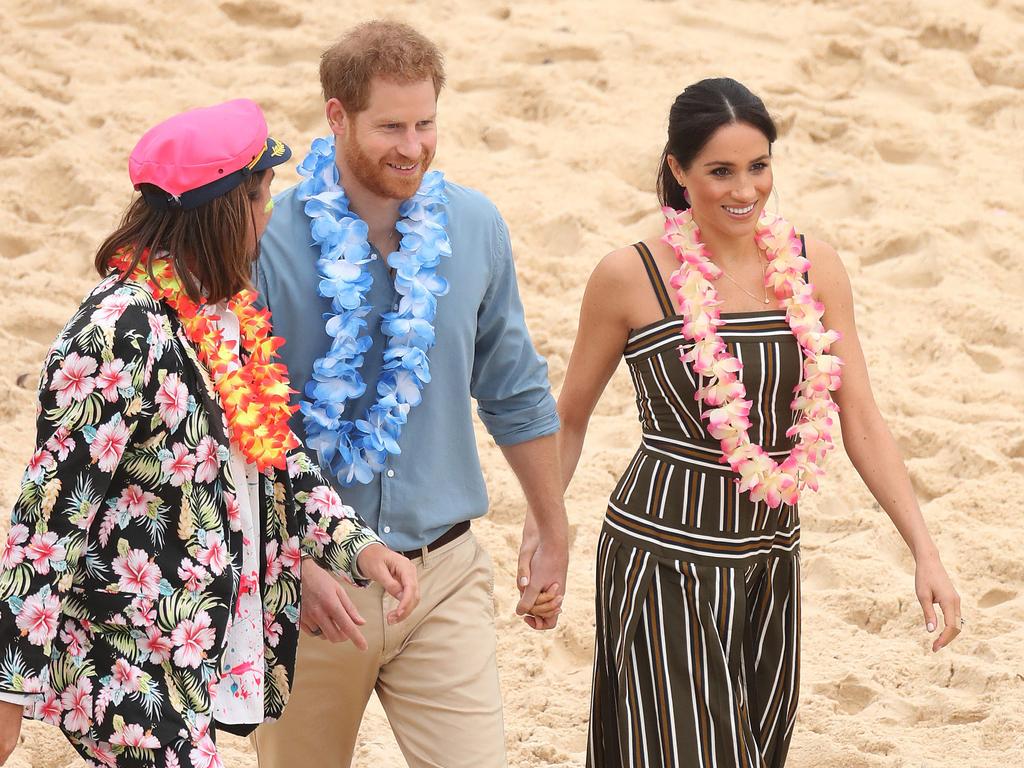 Prince Harry and Meghan Markle visit Bondi Beach to meet a local surfing community group raising awareness for mental health and wellbeing known as OneWave. Picture: Brett Costello