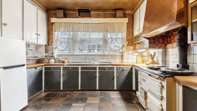 The AGA stove is a key feature of the retro kitchen.