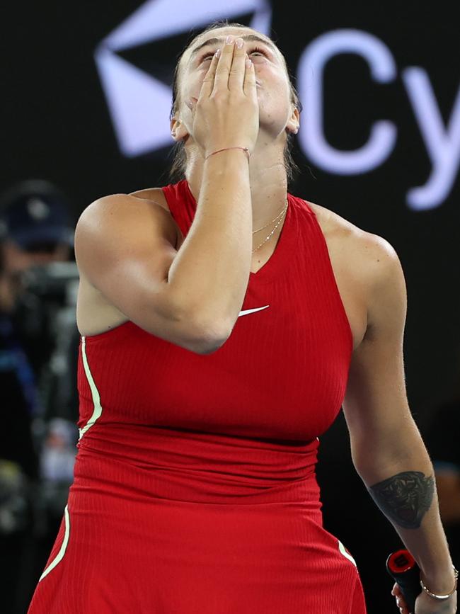 Sabalenka celebrates with a kiss to the heavens. Photo by Julian Finney/Getty Images