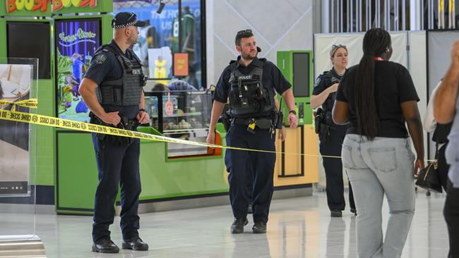 Police guard the crime scene of a stabbing of a 17 year boy near Boost Juice at Elizabeth City Centre in October last year. Picture: Mark Brake