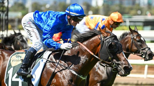 MELBOURNE, AUSTRALIA - MARCH 09: Jamie Kah riding Cylinder defeats Imperatriz in Race 5, the Yulong Newmarket Handicap, during Melbourne Racing at Flemington Racecourse on March 09, 2024 in Melbourne, Australia. (Photo by Vince Caligiuri/Getty Images)