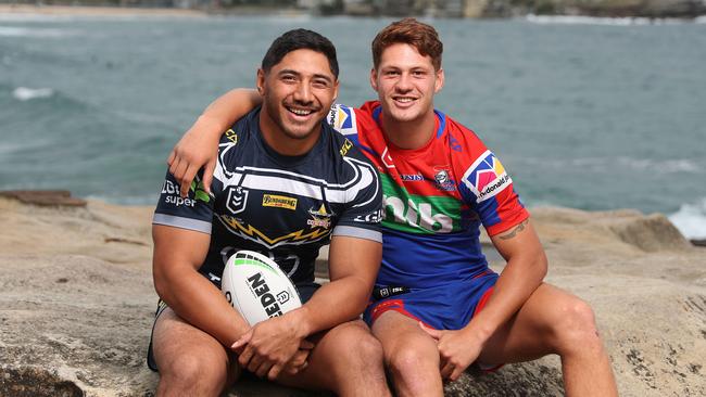 Cowboys Jason Taumalolo and Knights Kalyn Ponga during the 2019 NRL launch at Bondi Icebergs, Sydney. Picture: Brett Costello