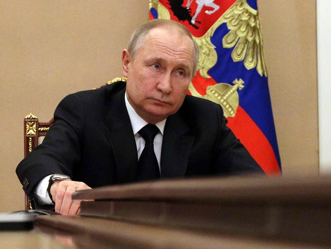 Russian President Vladimir Putin chairs a meeting with members of the Russian government via teleconference in Moscow on March 10, 2022. - Russia announced an export ban on more than 200 types of foreign-made products and equipment until the end of the year, part of Moscow's response to sanctions imposed over the Ukraine conflict on March 10. (Photo by Mikhail KLIMENTYEV / SPUTNIK / AFP)