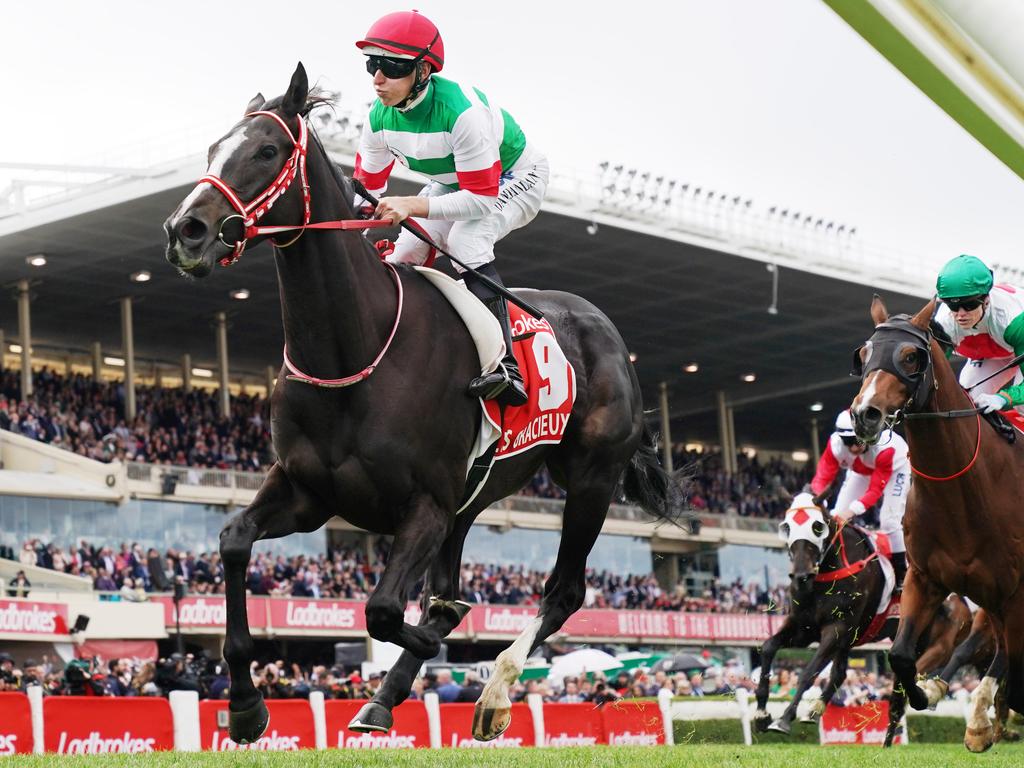 Lane and Lys Gracieux cross the finish line to win the Cox Plate.