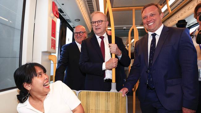 Prime Minister Anthony Albanese and Queensland Premier Steven Miles surprise commuters riding on the Gold Coast light rail. Picture: Adam Head