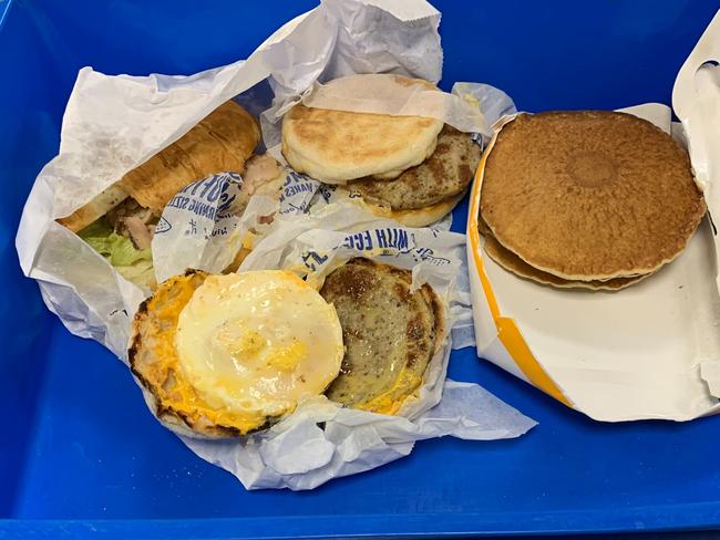 A traveller returning from Bali has been fined $2664 for carrying undeclared meat at Darwin Airport. Detector dog Zinta sniffed out a variety of items at-risk to food and mouth disease, including two sausage and egg McMuffins. Picture: Supplied