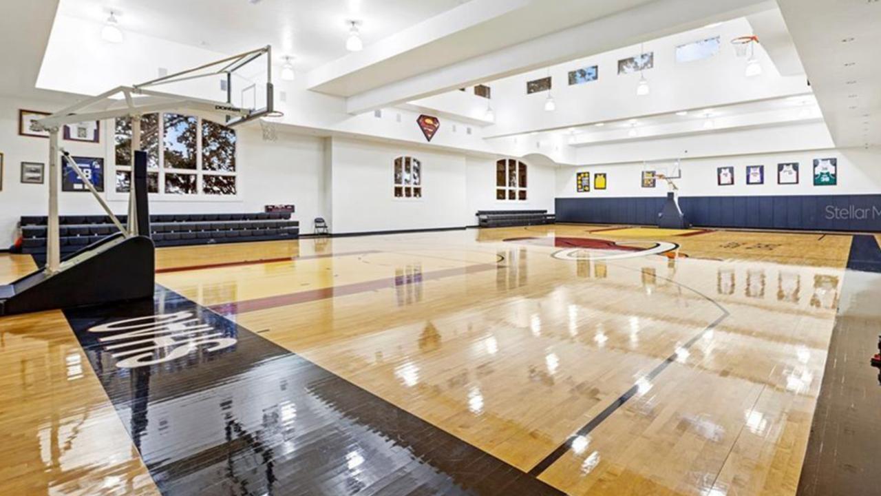 There’s a huge basketball court inside the home. Picture: Realtor