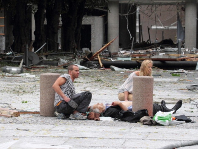 The scene after a car bomb planted by Breivik exploded outside government offices in Norway’s capital Oslo.