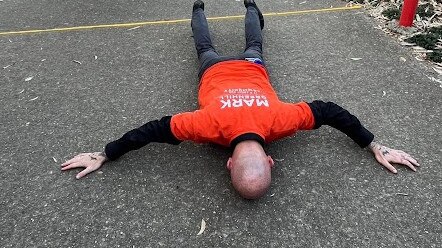 An exhausted Mayor Mark Greenhill takes a nap as polling ends.