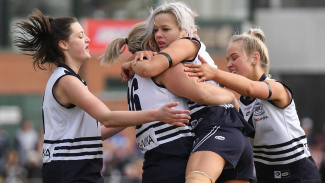 Bundoora players celebrate a goal during their Division 3 grand final victory over Eltham. Picture: Nathan McNeill.