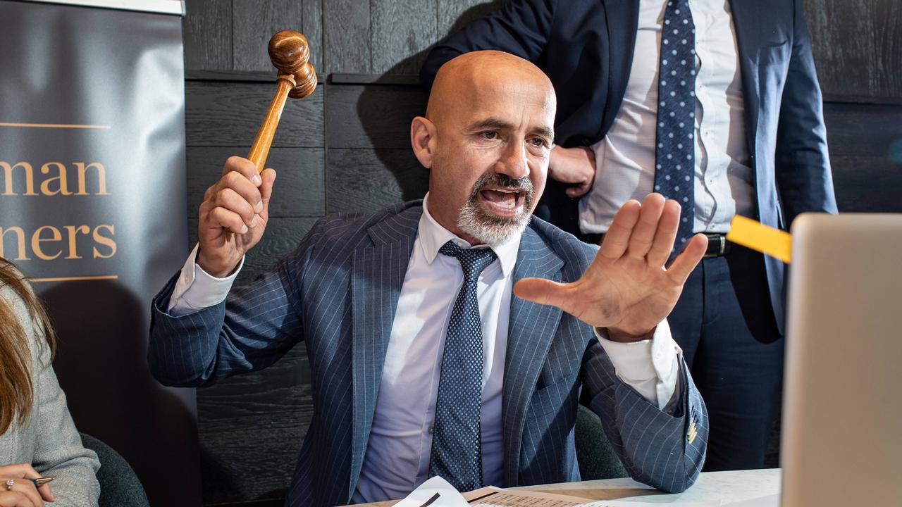 Sydney auctioneer Charles Baynie brings the gavel down in an online auction. Picture: Julian Andrews.