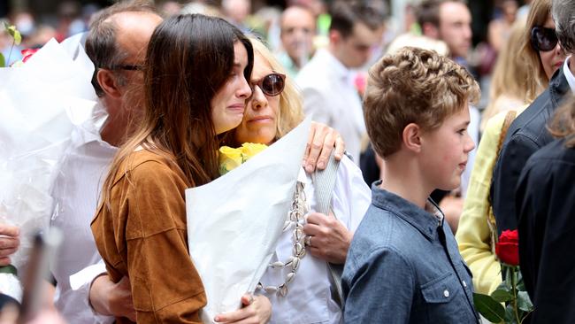 Tori Johnson's family arrive at Martin Place to take in the public support and to say farewell to Tori.