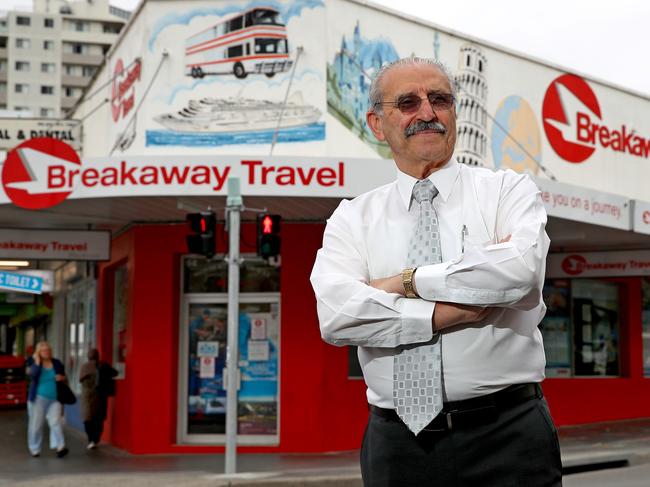 Travel agent George Vella lost five of his staff as business fell away. Picture: Toby Zerna