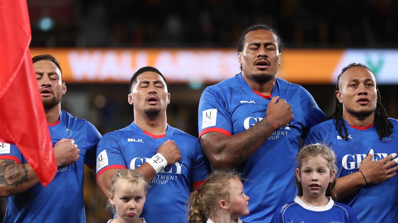 Samoan players sing their national anthem at Bankwest Stadium.