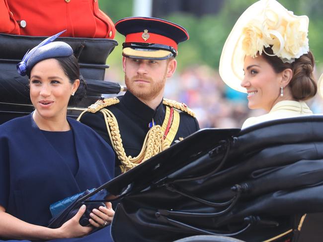 The Duke and Duchess of Sussex with the Duchess of Cambridge make their way along The Mall to Horse Guards Parade, in London, ahead of the Trooping the Colour ceremony, as The Queen celebrates her official birthday.. Picture date: Saturday June 8, 2019. See PA story ROYAL Trooping. Photo credit should read: Gareth Fuller/PA Wire