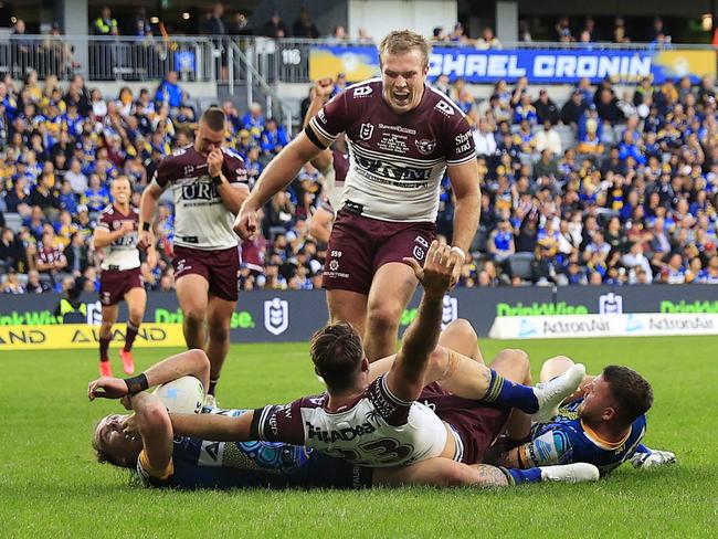 Karl Lawton of Manly celebrates his try during the round 11 NRL match between the Parramatta Eels and the Manly Sea Eagles. Picture: Mark Evans/Getty Images