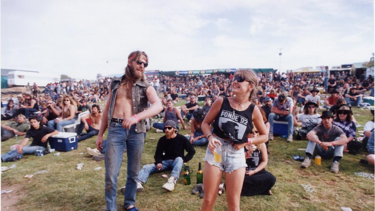 Music fans Tony Bradley and Vikki Rowe at Ponde rock music festival, held by the Hell's Angels Motorcycle Club in Ponde near Mannum, SA, 22 Feb 1992.