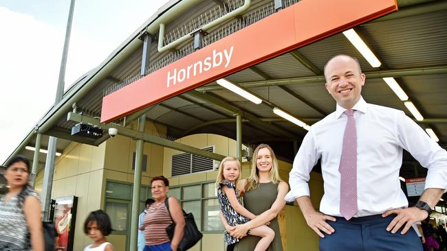 Hornsby state Liberal MP Matt Kean with commuter Wendy Paterson &amp; her daughter Monique, 4, at Hornsby Station at Hornsby on Tuesday December 4th. Hornsby MP Matt Kean is set to announce a new commuter carpark for Hornsby. Picture: AAP IMAGE / Troy Snook