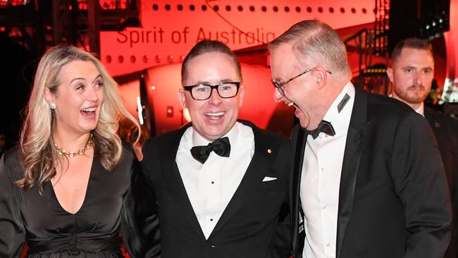 SYDNEY, AUSTRALIA - MARCH 31: (L-R) Jodie Haydon, Alan Joyce and Anthony Albanese at the Qantas 100th Gala Dinner at hangar 96 at Sydney's International Airport on March 31, 2023 in Sydney, Australia. (Photo by James D. Morgan/Getty Images)