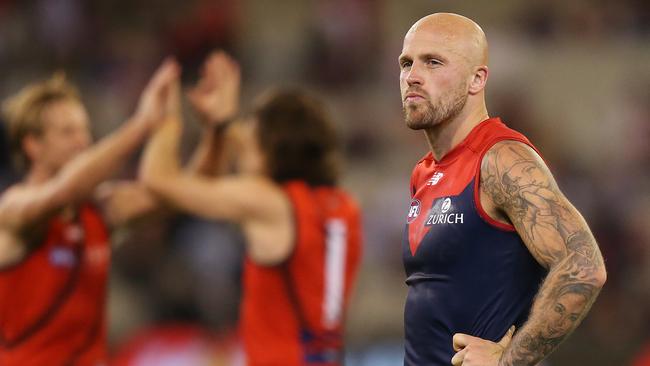 A dejected Nathan Jones after Melbourne suffered a defeat to Essendon. Picture: Michael Dodge/Getty Images.