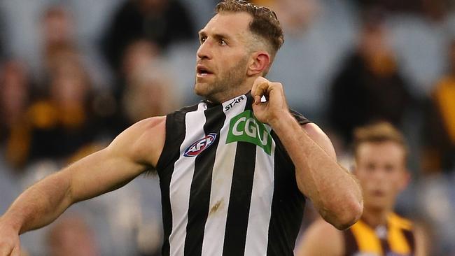 Travis Cloke tugs at his Collingwood jumper in the loss to Hawthorn. Picture: Wayne Ludbey