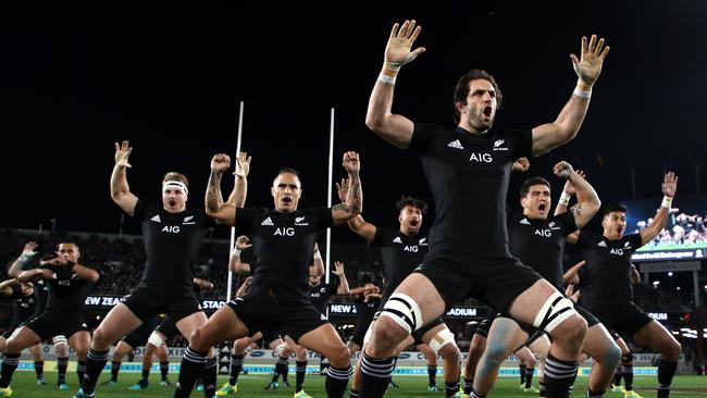 Sam Whitelock of the All Blacks performs the haka at Eden Park.