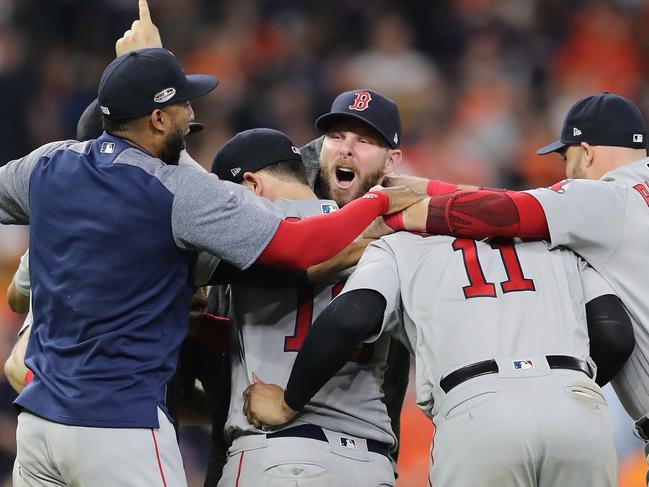 HOUSTON, TX - OCTOBER 18: Chris Sale #41 and the Boston Red Sox celebrate defeating the Houston Astros 4-1 in Game Five of the American League Championship Series to advance to the 2018 World Series at Minute Maid Park on October 18, 2018 in Houston, Texas.   Elsa/Getty Images/AFP == FOR NEWSPAPERS, INTERNET, TELCOS & TELEVISION USE ONLY ==