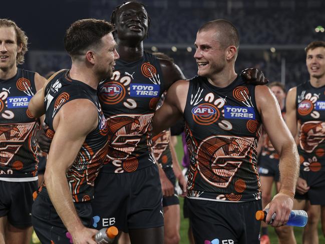 Leek Aleer, Toby Greene and Xavier O’Halloran enjoy the Giants’ win. Picture: Martin Keep/AFL Photos/Getty Images