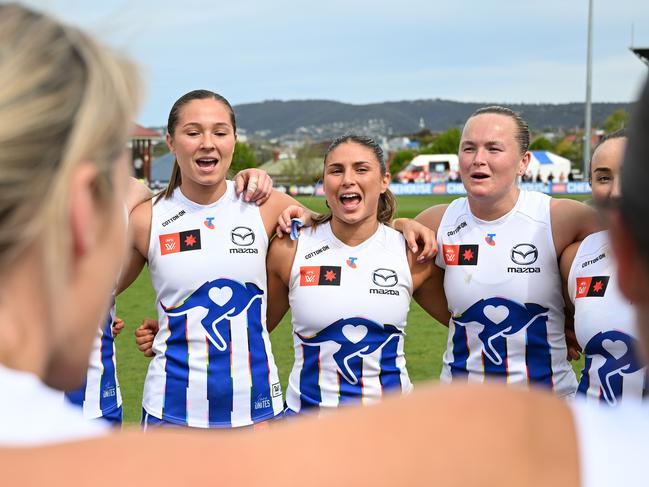 The Roos sing the song in Hobart after their win over Sydney. Picture: Steve Bell/AFL Photos/via Getty Images.