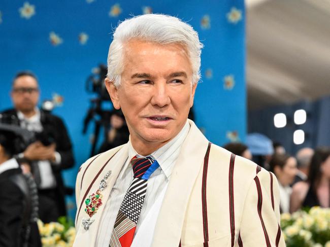 Australian director Baz Luhrmann arrives for the 2025 Met Gala at the Metropolitan Museum of Art on May 5, 2025, in New York. The Gala raises money for the Metropolitan Museum of Art's Costume Institute. The 2025 Met Gala is themed 