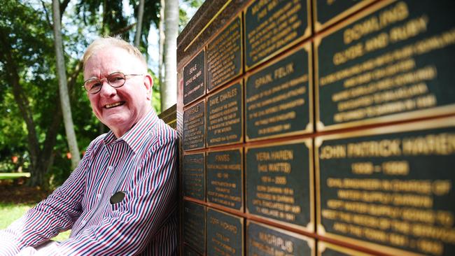 <s1>Greg Corr sits at Darwin’s Civilian Memorial Wall, where his father is recognised for his role as a post office worker during the Bombing of Darwin. </s1>                        <source>Picture: ELISE DERWIN</source>                                             <source/>