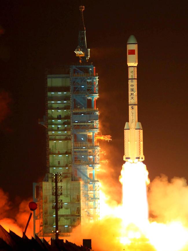 China's Long March 2F rocket carrying the Tiangong-1 module, or 