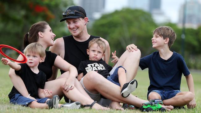 Nikki and Eddy Tillotson with their three sons Caysn, 3, Kail, 7, and Brody, 3, at New Farm Park. Picture: Tara Croser