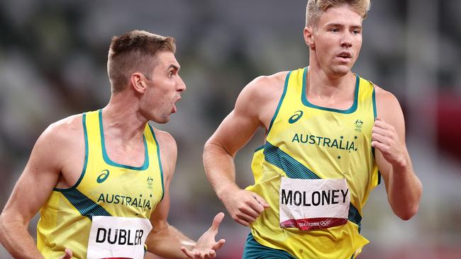 Cedric Dubler exhorts his Australian teammate Ashley Moloney for one last effort, spurring him on towards a bronze medal in the men’s decathlon. Picture: Patrick Smith/Getty Images