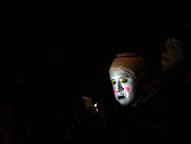 <!DOCTYPE html PUBLIC "-//W3C//DTD HTML 4.0 Transitional//EN" "http://www.w3.org/TR/REC-html40/loose.dtd"><html><body><p>Clowns need technology, too... A clown looks at his phone during the second day of the XXI Convention of Clowns, at the Jimenez Rueda Theatre, in Mexico City on October 18, 2016. Picture: AFP PHOTO / PEDRO PARDO</p></body></html>