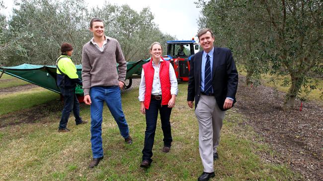 Marcus Oldham principal Simon Livingstone in 2012, pictured with students Rosie McClymont and Stuart Tait on Murradoc Farm near Geelong, which was gifted to the college by Philip Myer. Picture: Aaron Francis