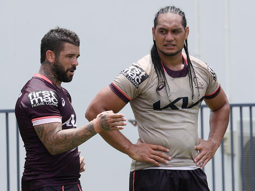 Adam Reynolds talks shop with Marty Taupau. Picture: Liam Kidston