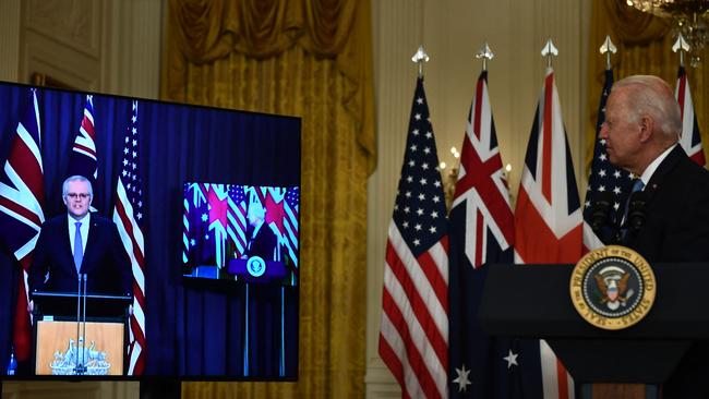 US President Joe Biden watches as Australian Prime Minister Scott Morrison speaks virtually. Picture: AFP