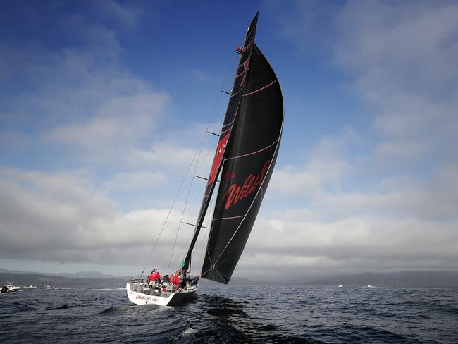 Wild Oats XI skippered by Mark Richards sails up the River Derwent on her way to a 9th line honours victory in the 2018 Sydney to Hobart Yacht Race. The yacht crossed the line in 1d 19hrs 7mins 21secs . Picture: RICHARD JUPE