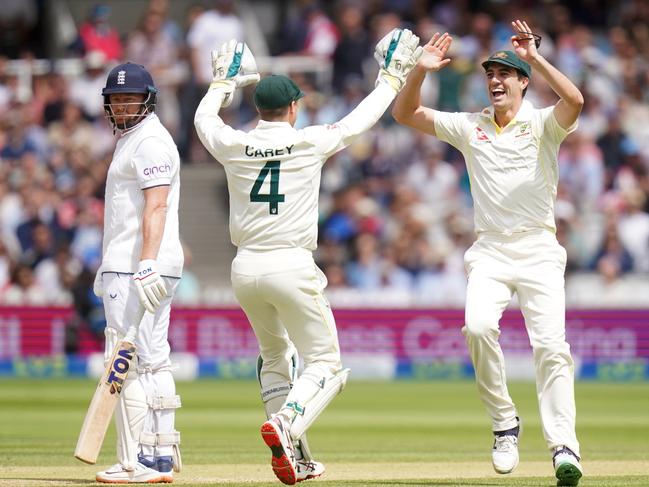 The Aussies and thrilled, while Bairstow can barely believe what has happened. Picture: Adam Davy/PA Images via Getty Images.